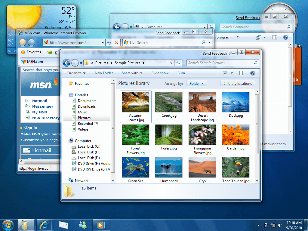 Windows 7 Aero desktop with glass windows and nature wallpaper
